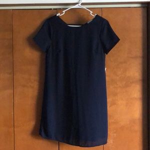 Dark blue dress with an open back